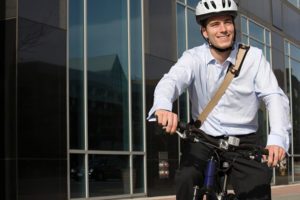 Office worker riding bicycle