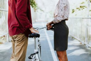 Woman and man talking on pathway